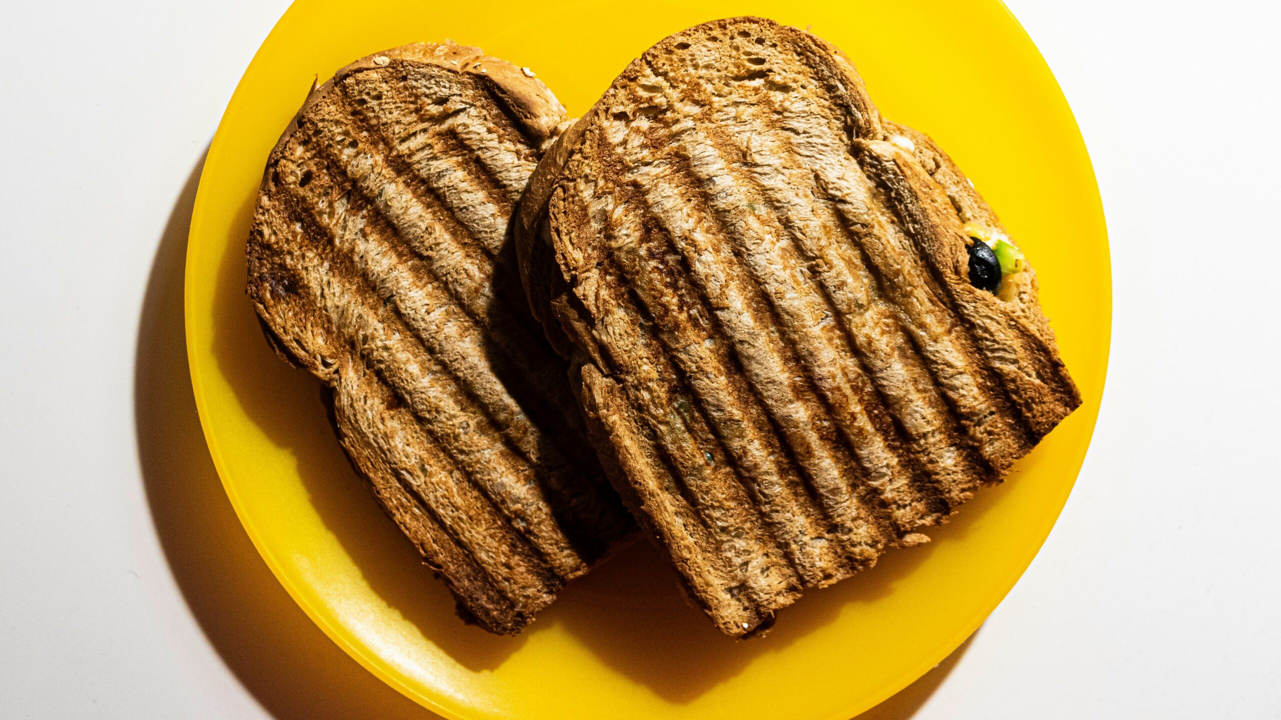 brown cookies on yellow plate